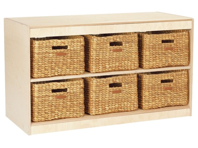 meuble de rangement à hauteur d'enfants avec des bacs de rangement en matière naturelle jacinthe d'eau